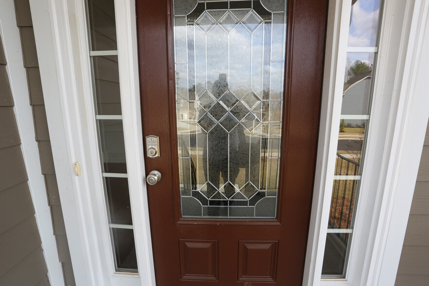 Front door with new keypad lock. - 2001 Trading Path Lane