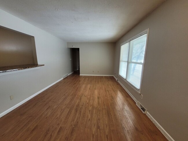 Building Photo - Four Bedroom Single-Family Home