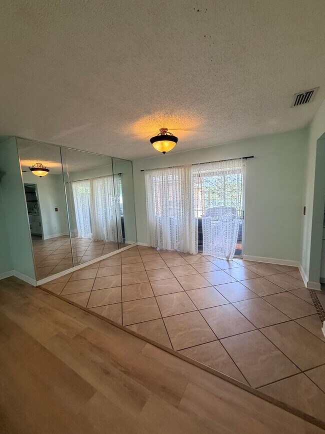 Building Photo - Beautifully Remodeled Lake Front Solar home. Call Sheila Campbell 407-687-7900