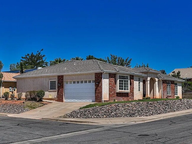 Building Photo - "Charming 4-Bed Oasis with Elegant Hardwoo...
