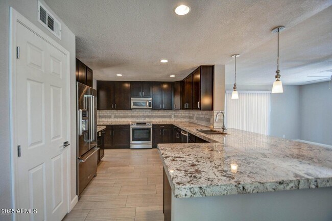Building Photo - 4834 E Hillery Dr