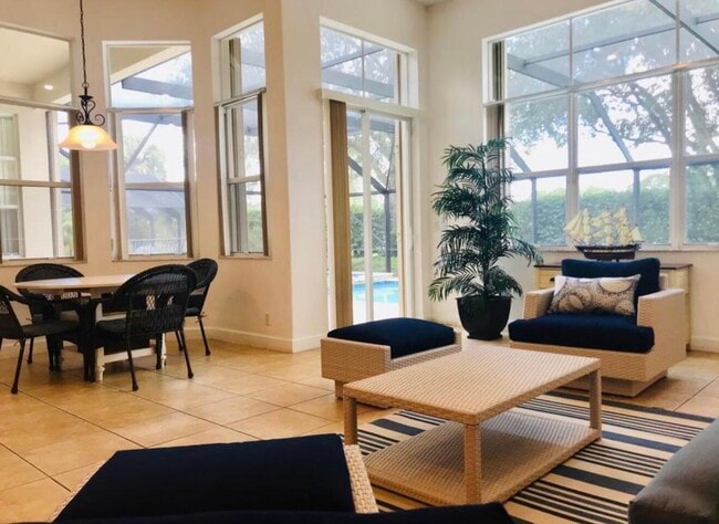 Building Photo - 10440 Cypress Lakes Preserve Dr