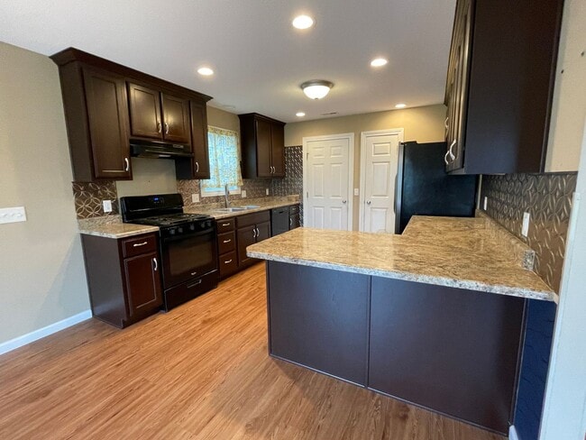 Building Photo - Home For Rent By Capital Property Management