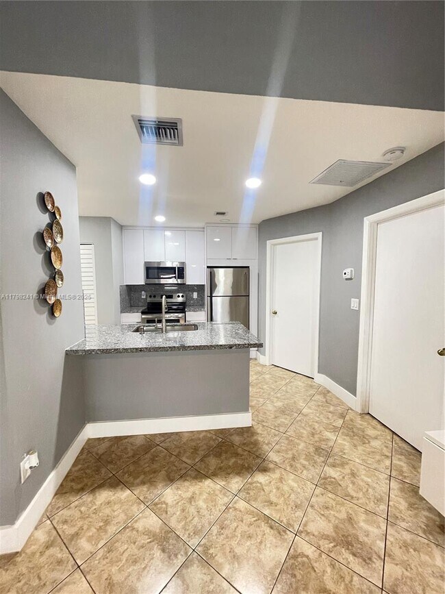 Building Photo - 18310 NW 68th Ave