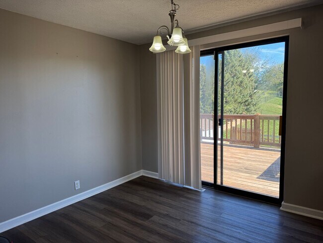 Building Photo - Bright and spacious split-entry home with a finished lower level, large yard, and plenty of updates!