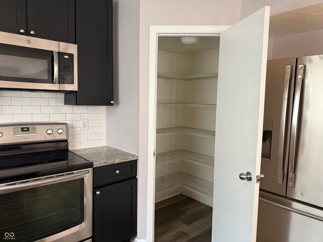 Building Photo - 5643 Imperial Woods Cir