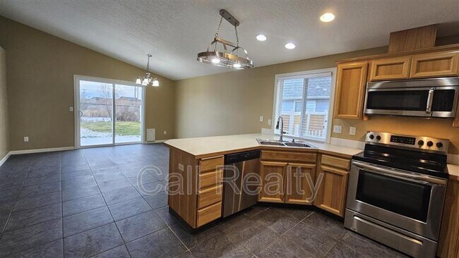 Building Photo - 9302 W Caelen Ave