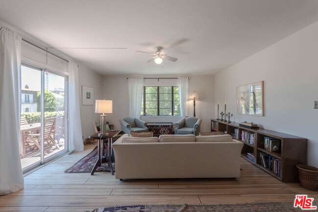 Building Photo - 10959 Strathmore Dr