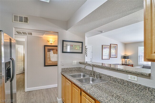 Building Photo - 5055 W Hacienda Ave