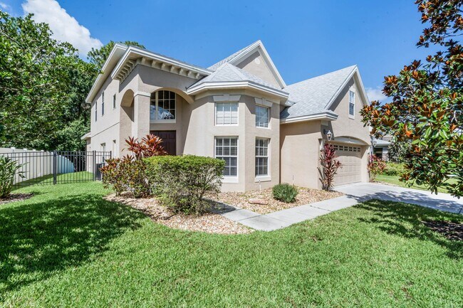 Building Photo - 4/2.5/2 Woodland Lakes Preserve Available Now