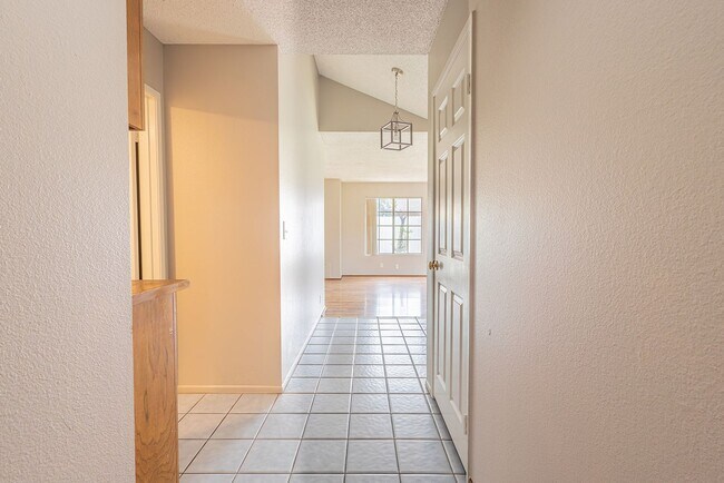 Building Photo - Spacious Single-Story 3-Bedroom Condo with Private Patio and 2-Car Garage