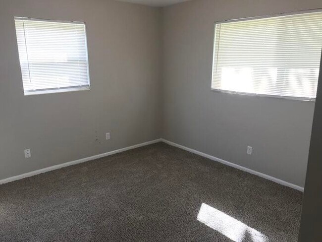 Building Photo - Spacious 4 Bedroom Home With Garage And Modern Updates