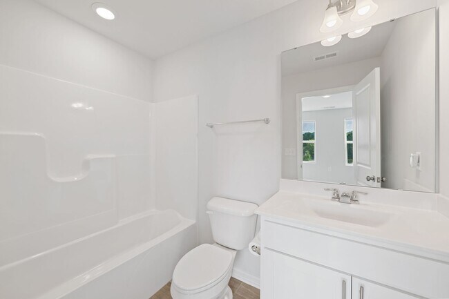 Building Photo - Charming 3-bedroom, 3.5-bathroom townhouse located in the heart of Durham, NC!