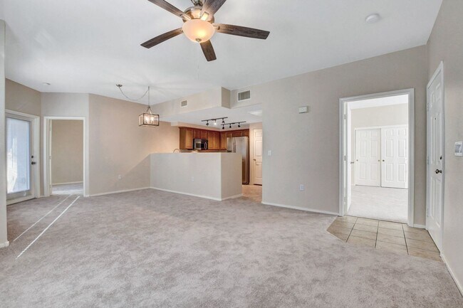 Building Photo - FIRST FLOOR CONDO IN GATED COMMUNITY W/ SINGLE CAR GARAGE