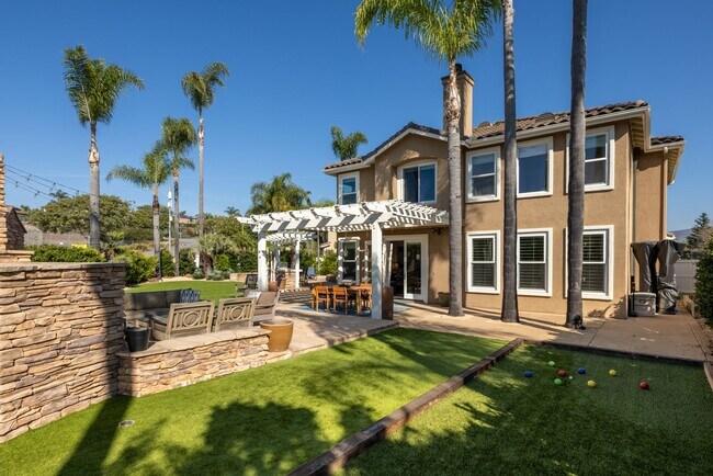 Building Photo - Coastal Retreat in La Costa - Spacious Home with Backyard Oasis