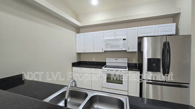 Building Photo - 303 NE 24th Ave