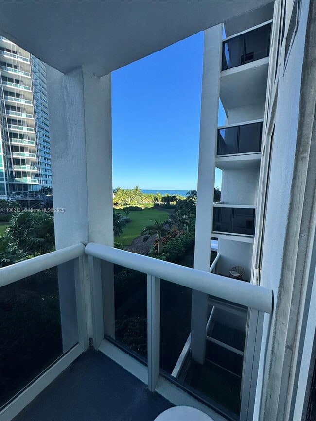 Building Photo - 10275 Collins Ave