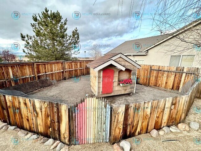 Building Photo - Open Kitchen, Expansive Living, and Covered Patio in Tranquil South Reno Near Trails, Parks & Sho...