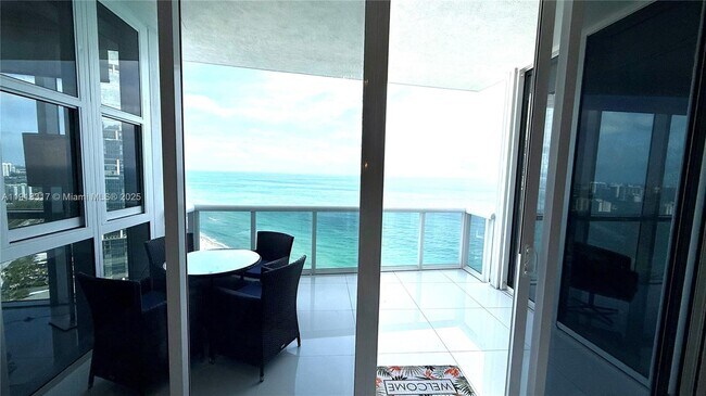 Building Photo - 18201 Collins Ave