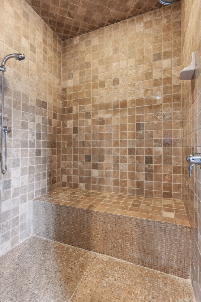 This bath features a large walk-in shower - 745 Rice St E