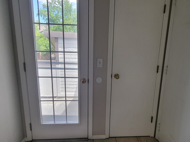 Coat Closet/Door to Patio - 4921 Garrison St