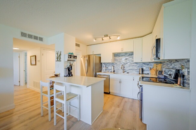 Building Photo - Available February 1st, 2026!  Cocoa Beach Waterfront Condo