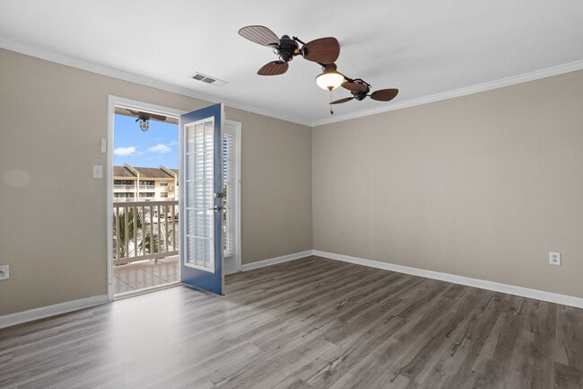 Building Photo - Welcome to Harbor Landing Condominiums — where coastal living meets convenience!