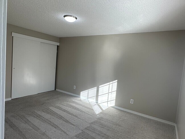 Building Photo - Spacious & Stylish 3BD Home with Iconic Stone Fireplace + Soaking Tub