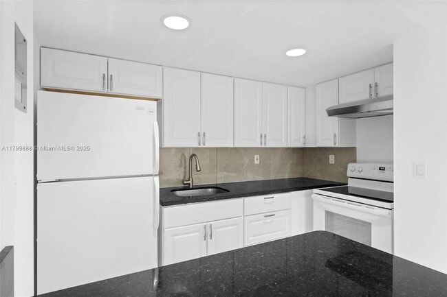 Building Photo - 4335 NW S Tamiami Canal Dr