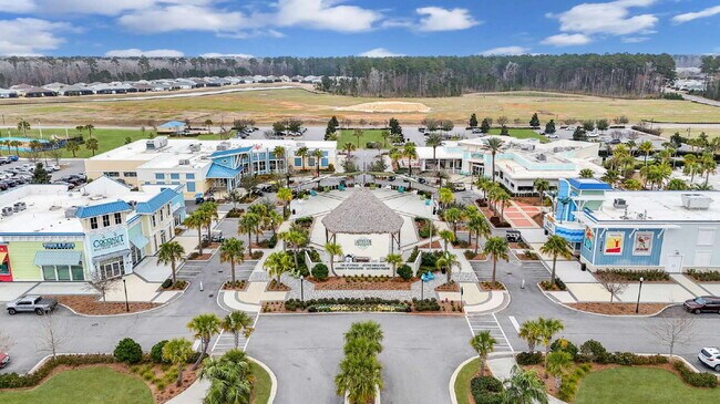 Building Photo - "Charming 2-Bedroom Retreat with 2 Baths and Den - 1558 Sq. Ft. of Comfort in Latitude Margaritav...