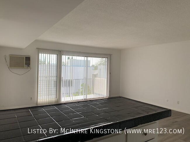 Building Photo - Move-in Specials Await in this Spacious 2B...