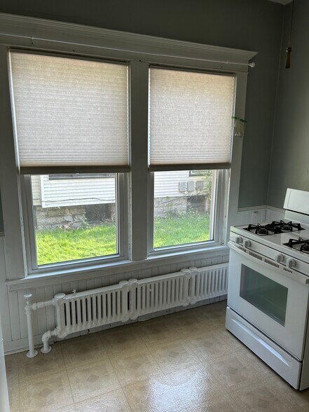 Kitchen with new windows - 10 Granger Pl