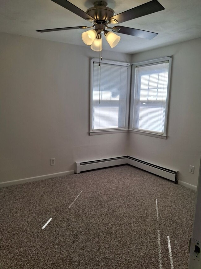 Building Photo - Charming 3-Bedroom Home with Backyard & Of...