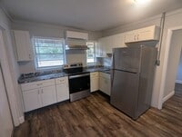 Building Photo - Charming 1 Bedroom 1 Bath Condo. Utilities included. Fury friends Welcome!