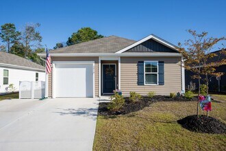 Building Photo - Charming 4-Bedroom Home in Desirable Waterside Community – Surf City, NC
