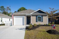 Building Photo - Charming 4-Bedroom Home in Desirable Water...