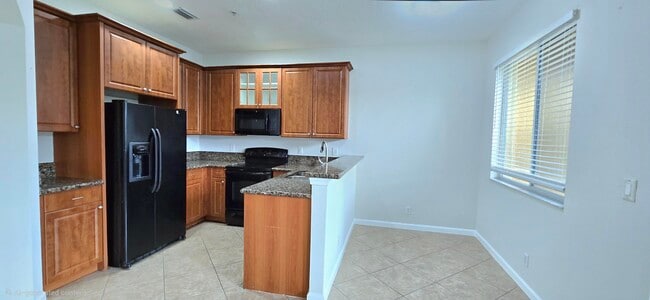 Building Photo - 4305 Coventry Pointe Way