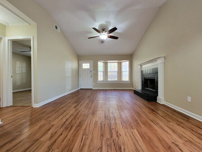 Building Photo - 2 bedroom duplex for rent right away off E Mahan, wood floors and fireplace for $1450 per month