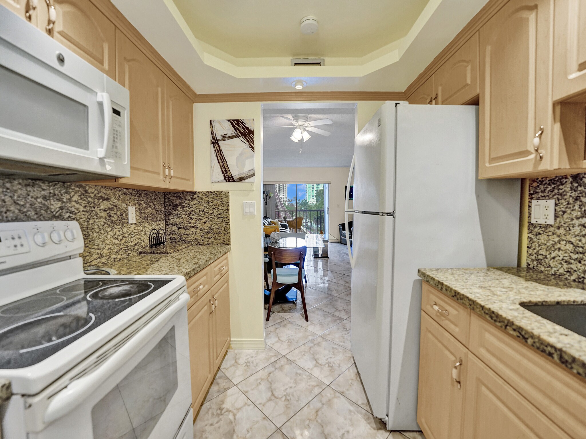 Kitchen with range and microwave - 201 178th Dr