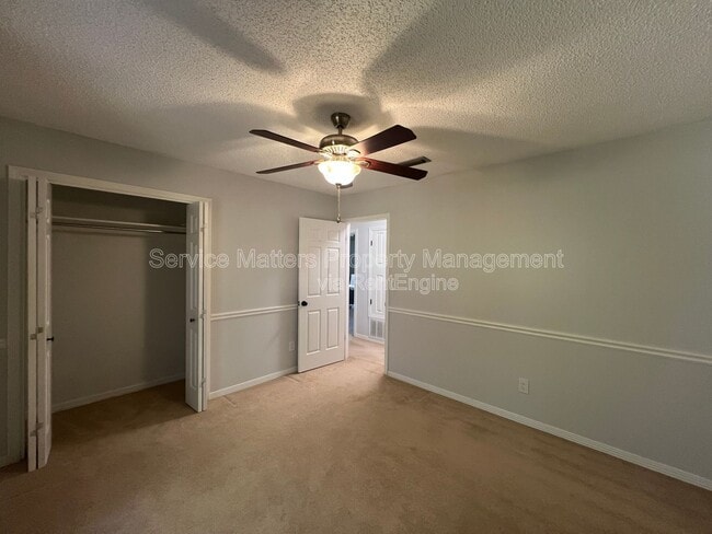 Building Photo - 6004 Players Pl