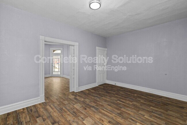 Building Photo - 3402 Dunnica Ave