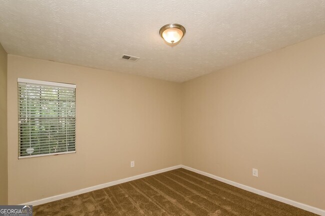 Building Photo - 8495 N Pond Dr