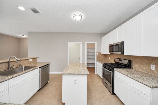 Building Photo - 7447 Oakwood Canyon Dr