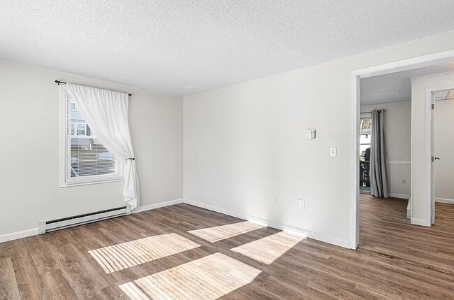 Building Photo - Spacious Layouts with Natural Light