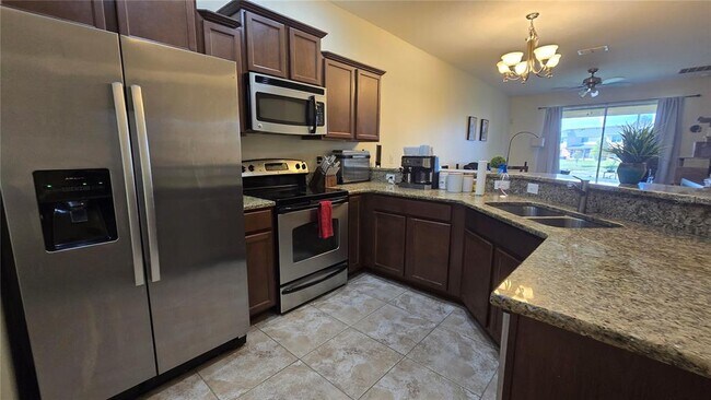 Building Photo - 4085 Shadetree Ln