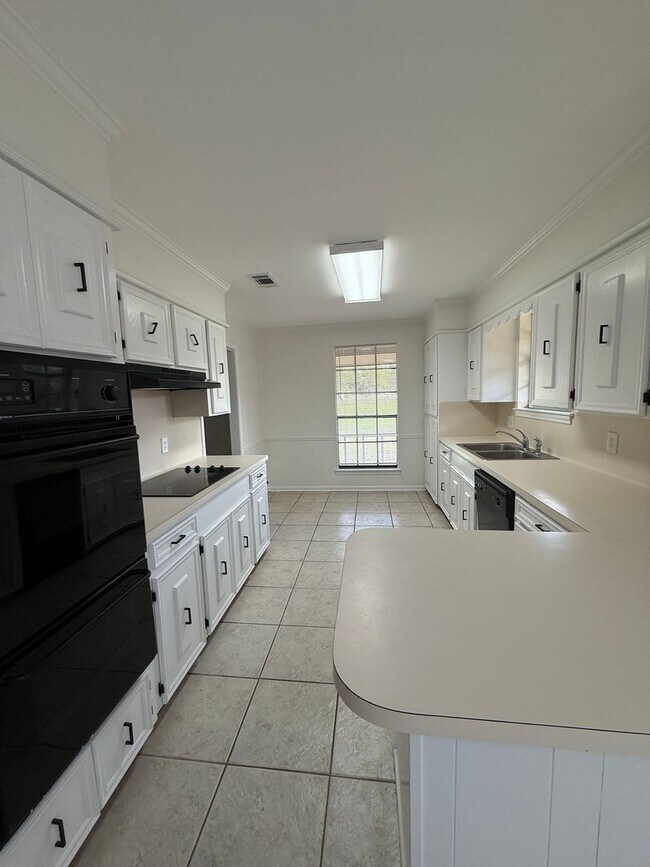 Building Photo - Must see this Beautiful Remolded 4 Bedroom...