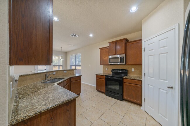 Building Photo - Spacious 4-Bed Home with Island Kitchen, Private Patio & Fenced Yard in Schertz