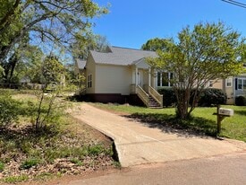 Front of house showing long private driveway - 205 N Beacon St