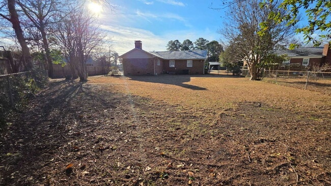 Building Photo - Updated 3-Bedroom Home with Open Layout and Large Backyard