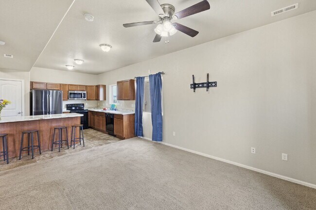 Building Photo - "Beautiful Townhome 3-Bedroom  2.5 Baths no carpet home, just 7 minutes from Fort Carson!"